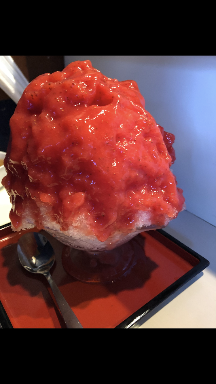 Vivid red strawberry shaved ice (kakigori) at Himitsudo in Nippori, Tokyo.